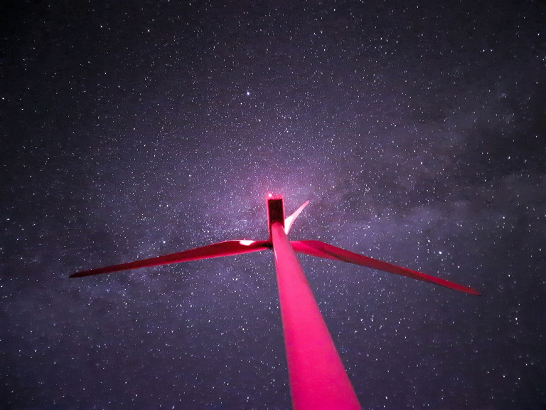 Close up of a windmill against a background of the Milky Way galaxy shot with the Galaxy S20 Ultra.