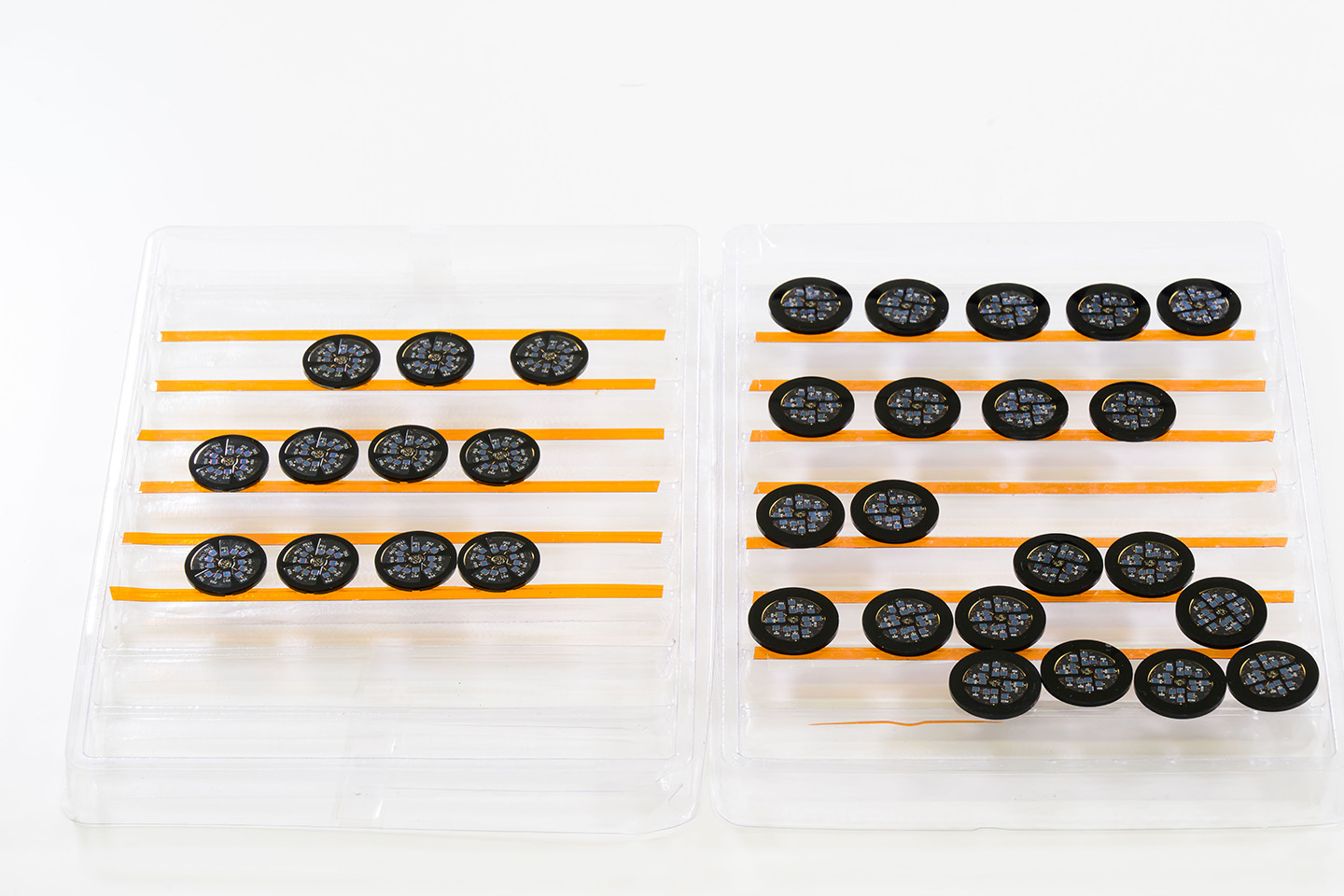Galaxy Watch8’s LED-PD sensor modules placed on a transparent platform with nests.