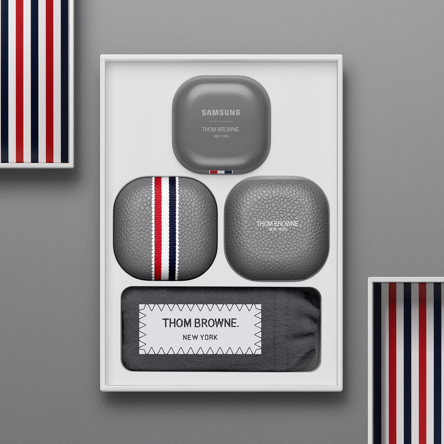 Case for the Galaxy Buds Live Thom Browne Edition in their box. Close shot.