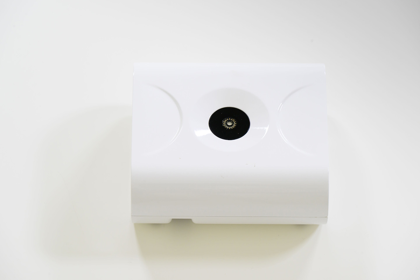 The clinical-ready prototype of the Antioxidant Index feature's BioActive sensor, rectangular and white in design. 