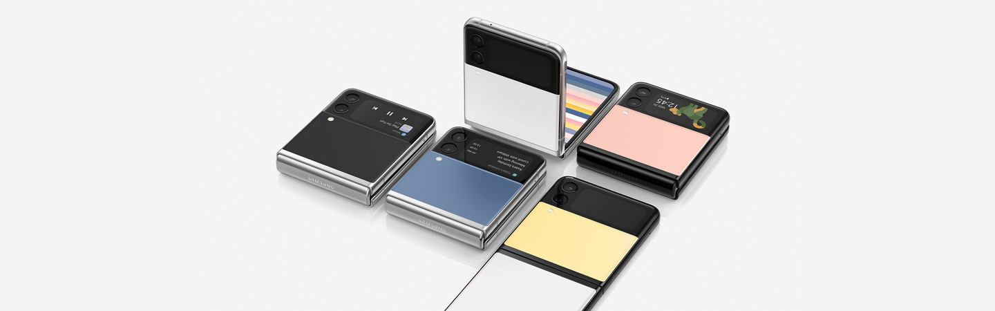 Five Galaxy Z Flip3 Bespoke Edition devices of different colors displayed on a white table.