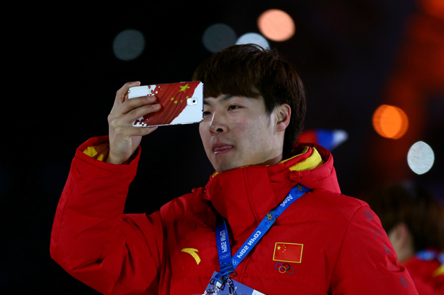 Athletes enjoying the opening ceremony of the Sochi 2014 Olympic Winter Games with the official Olympic Games phones, the Samsung Galaxy Note 3